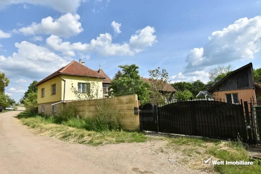 Casă cu Teren 1683 Mp în Băgara
