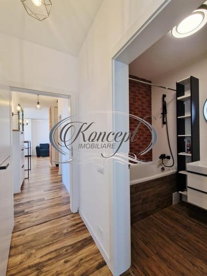 Apartament cu 3 camere semidecomandat, mobilat în Borhanci