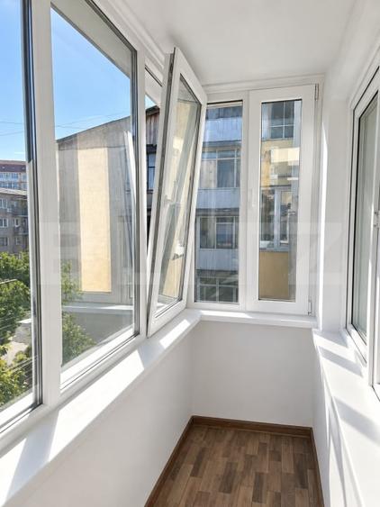 Apartament cu 3 camere semidecomandat, mobilat în Central