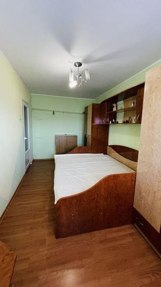 Apartament cu 3 camere decomandat în