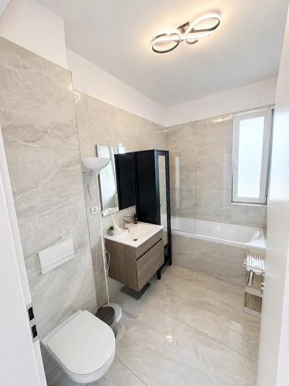 Apartament cu 2 camere semidecomandat, mobilat în Giroc