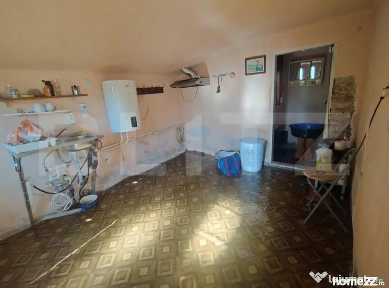 Casă cu 4 camere cu Teren 1100 Mp în Central