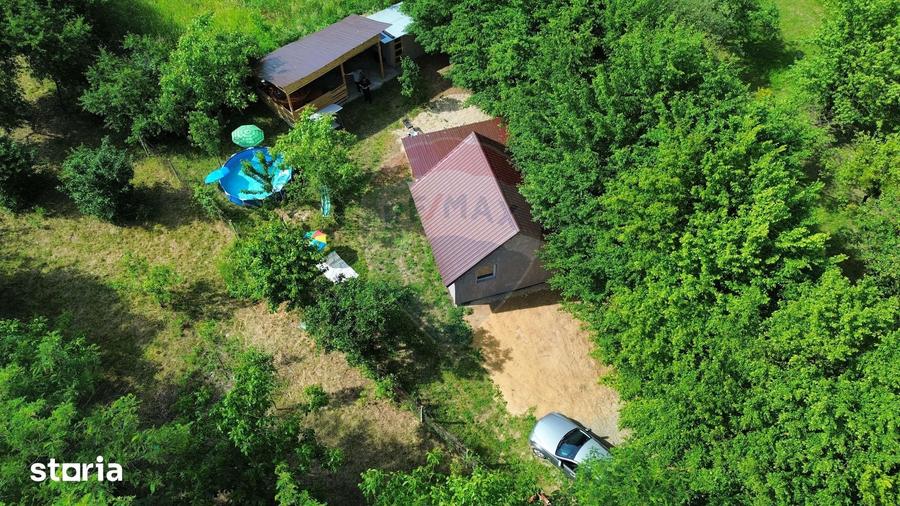 Casă cu 2 camere cu Teren 450 Mp în Coltău