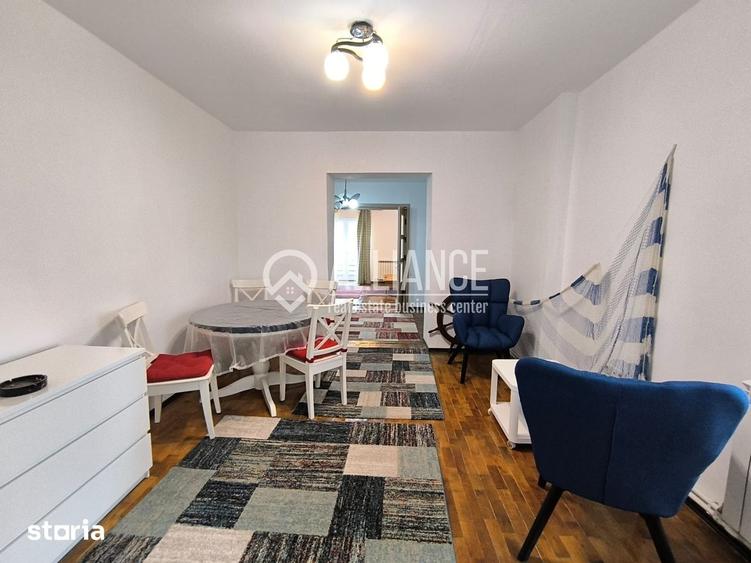 Apartament cu 3 camere semidecomandat, mobilat în Central