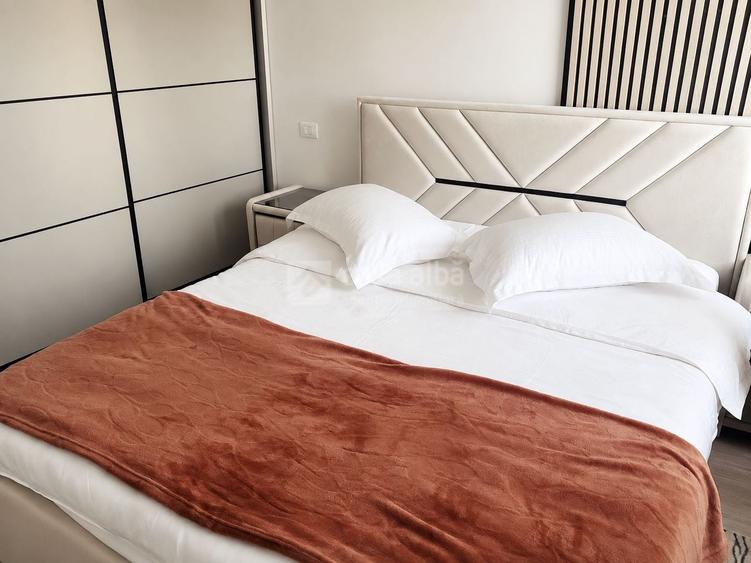Apartament cu 2 camere semidecomandat, mobilat în Central