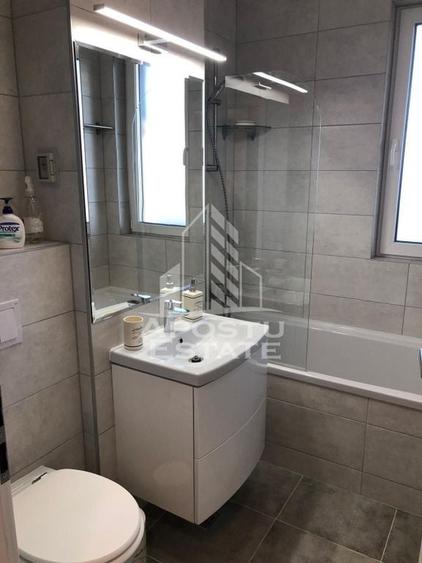 Apartament cu 2 camere semidecomandat, mobilat în Torontalului