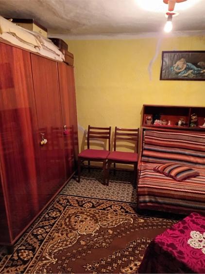 Casă cu 2 camere cu Teren 500 Mp în Cârlomănești