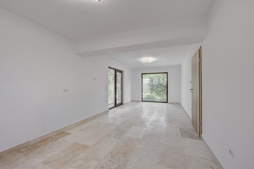 Casă individuală cu 4 camere cu Teren 540 Mp în Otopeni