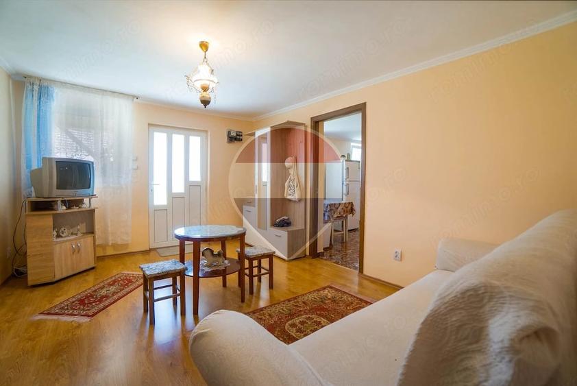 Casă cu Teren 565 Mp în Zizin