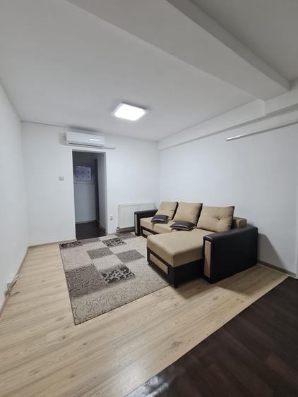 Apartament cu 2 camere semidecomandat, mobilat în
