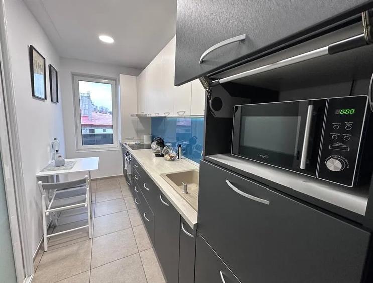 Apartament cu 2 camere semidecomandat, mobilat în Borhanci