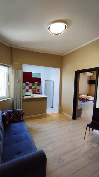 Apartament cu 2 camere semidecomandat, mobilat în P-ța Romană — fotografia 3