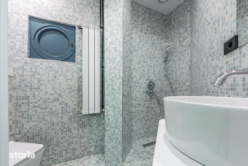 Apartament cu 4 camere în Romană