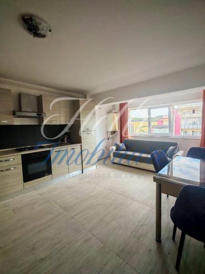Apartament cu 2 camere semidecomandat, mobilat în Baciu
