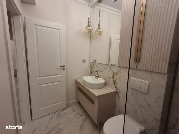 Apartament cu 2 camere, mobilat în Central