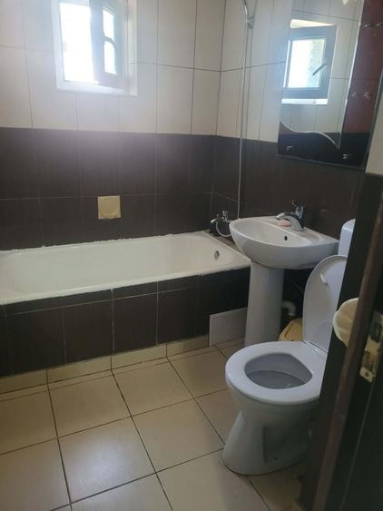 Apartament cu 3 camere decomandat în Romanești