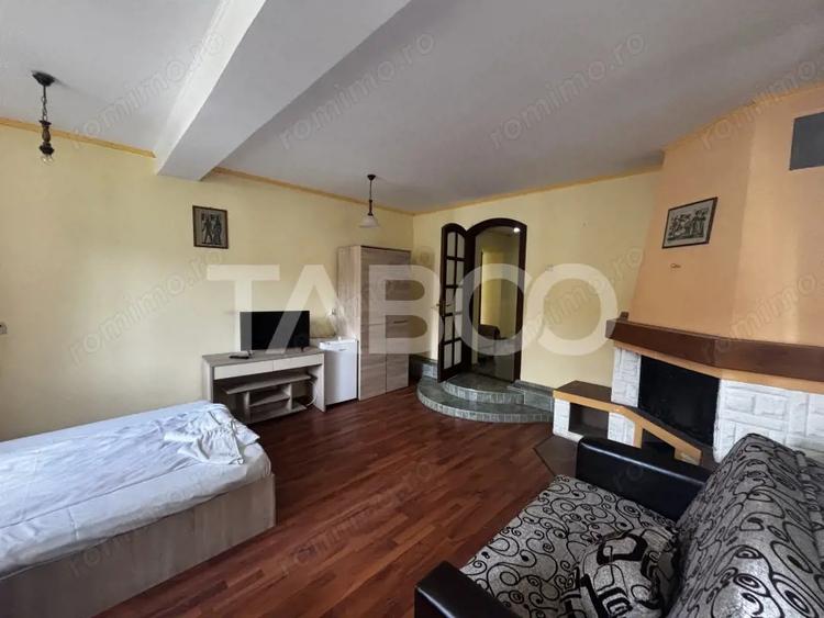 Casă cu 5 camere cu Teren 250 Mp în Cisnădioara