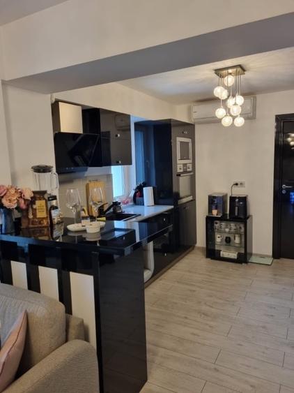 Apartament cu 2 camere decomandat, mobilat în Central