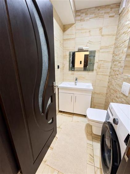 Apartament cu 3 camere nedecomandat, mobilat în Tractorul