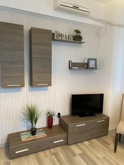 Apartament cu 2 camere semidecomandat, mobilat în Central