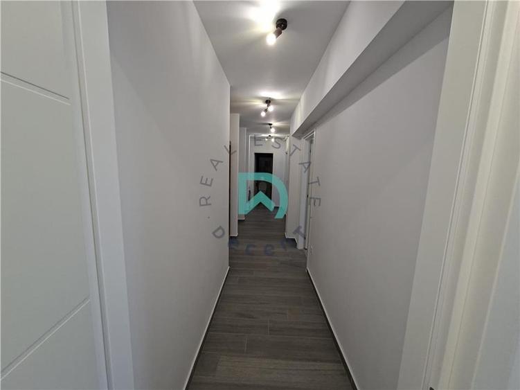 Apartament cu 3 camere decomandat în Tractorul