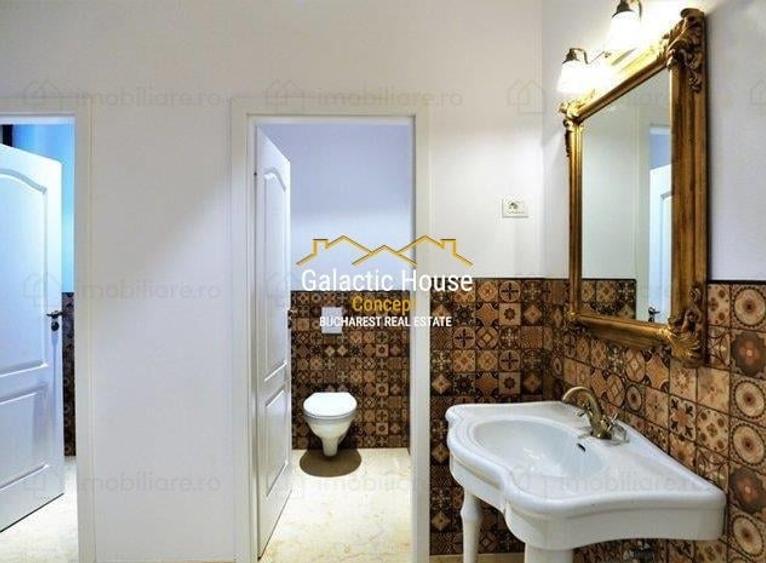 Casă individuală cu 12 camere cu Teren 475 Mp în Romană