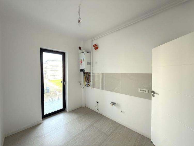 Etaj 1. Decomandat - bucatarie inchisa. Drum asfaltat. Loc de parcare. - 4