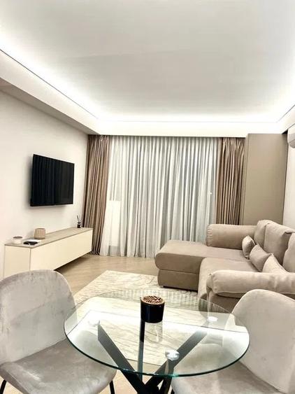 Apartament cu 2 camere decomandat în Aviației — fotografia 3
