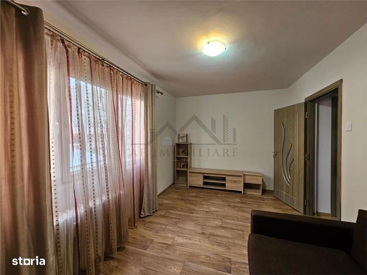 Apartament cu 2 camere semidecomandat, mobilat în Podu Roș