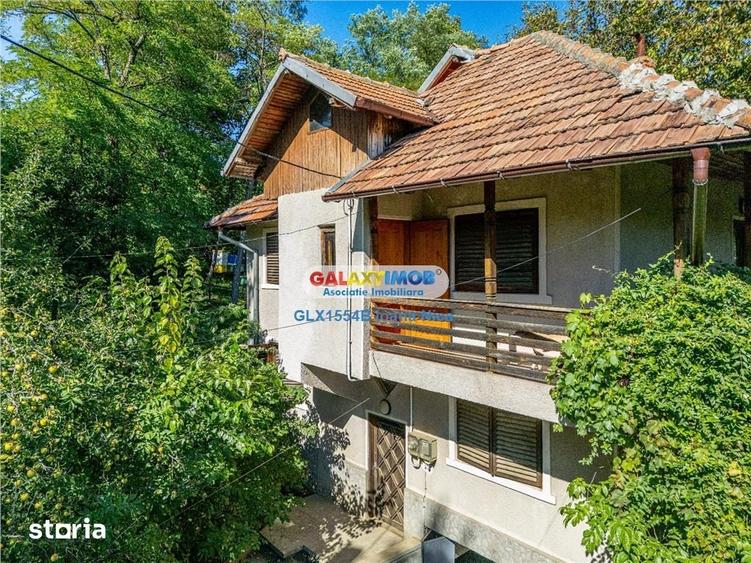 Casă cu 7 camere cu Teren 1000 Mp în Central