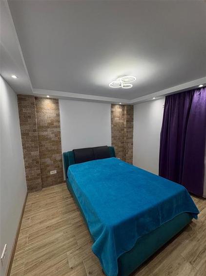 Apartament cu 4 camere decomandat în Răcădău