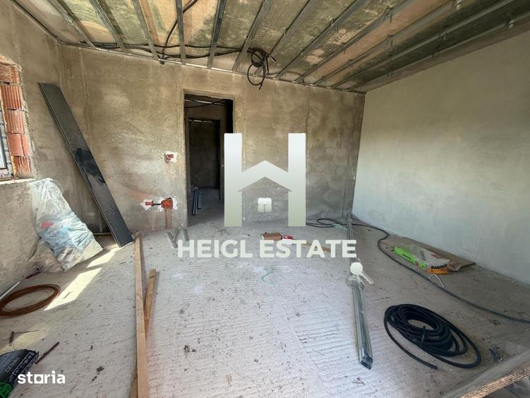 Casă cu 4 camere cu Teren 660 Mp în Izvin