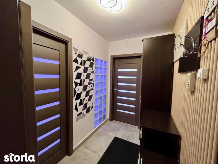 Apartament cu 2 camere semidecomandat, mobilat în Est