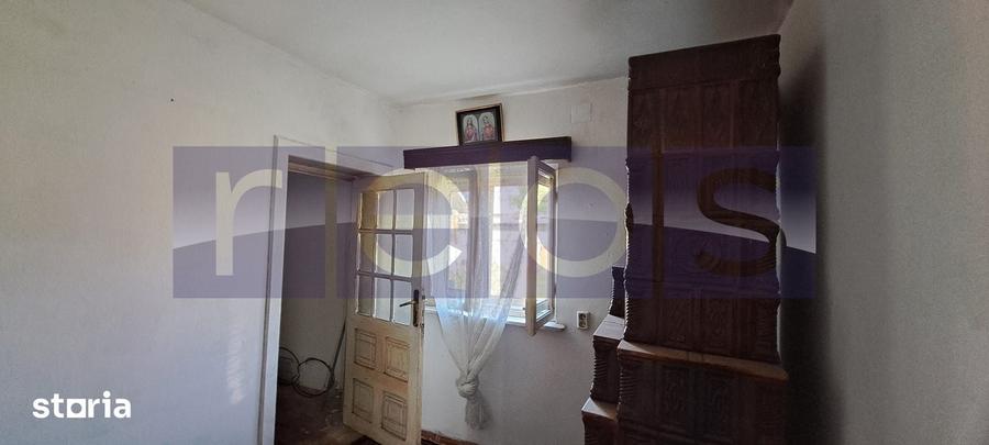 Casă cu 4 camere cu Teren 1200 Mp în Măldăeni