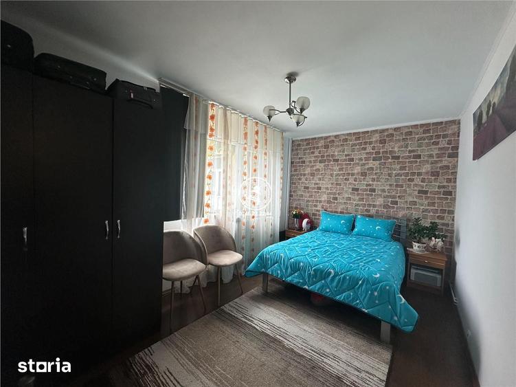 Apartament cu 3 camere semidecomandat, mobilat în Podul de Piatră