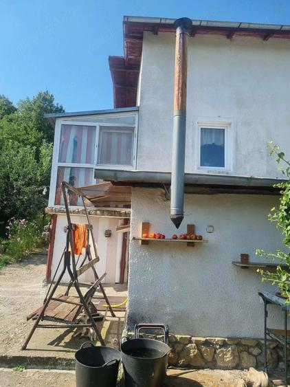 Casă cu Teren 1000 Mp în Băbana