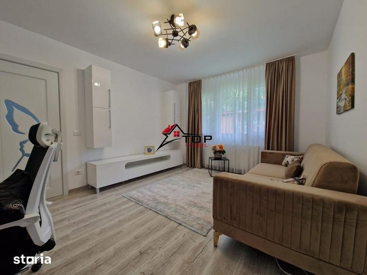 Apartament cu 2 camere semidecomandat, mobilat în Podu Roș