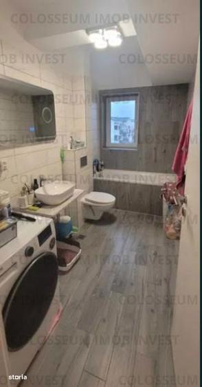 Apartament cu 3 camere decomandat în Tractorul