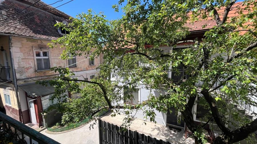 2 camere în inima orașului – ideal pentru locuit sau investiție - 7