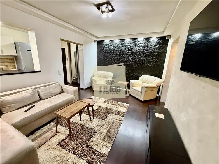 Apartament cu 2 camere semidecomandat, mobilat în Central