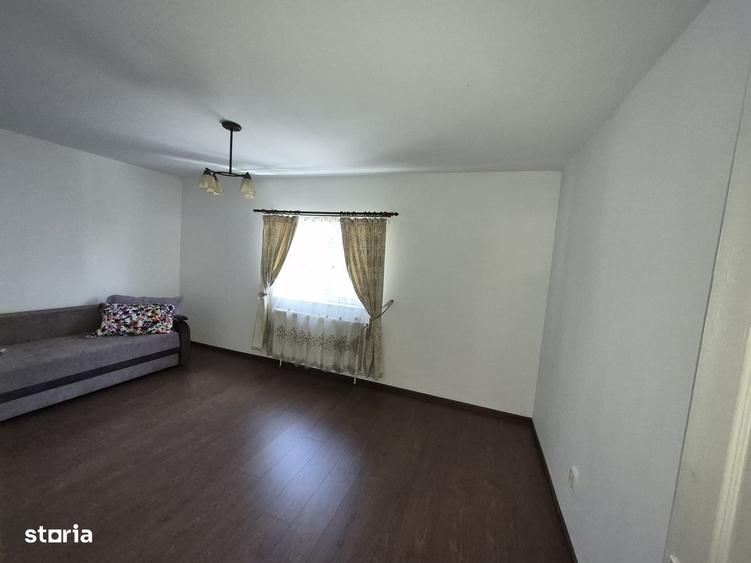 Apartament cu 4 camere decomandat în Bucium