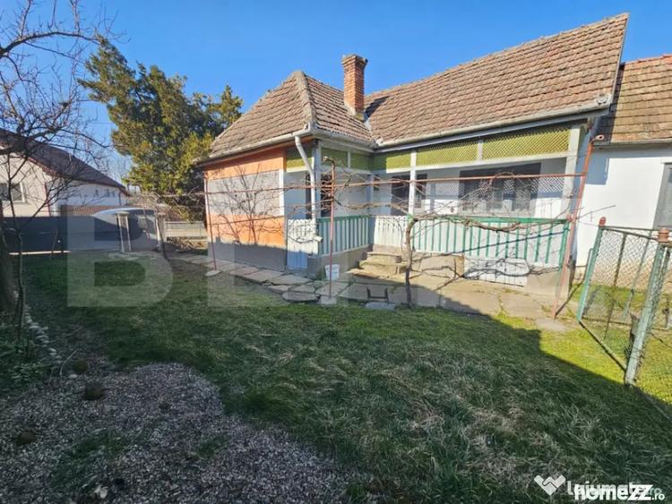 Casă cu 4 camere cu Teren 1000 Mp în Sâncel