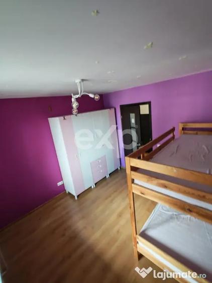 Apartament cu 3 camere decomandat în Tractorul
