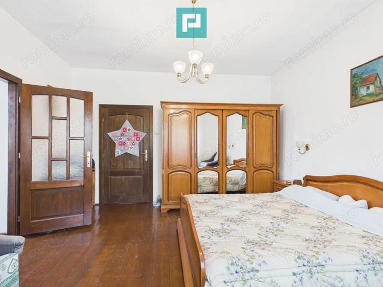 Casă cu Teren 1439 Mp în Bobda
