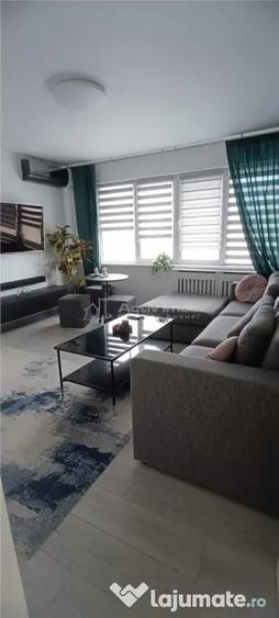 Apartament cu 3 camere semidecomandat în 1 Mai