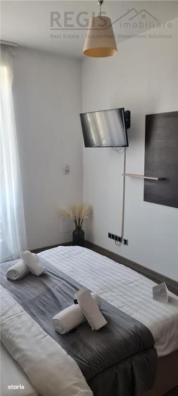 Apartament cu 2 camere decomandat în Poiana Brașov