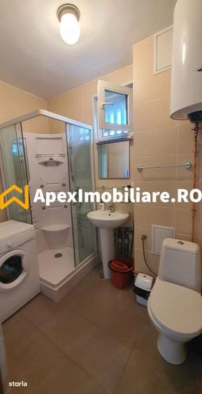 Apartament cu 3 camere semidecomandat în Gara de Nord