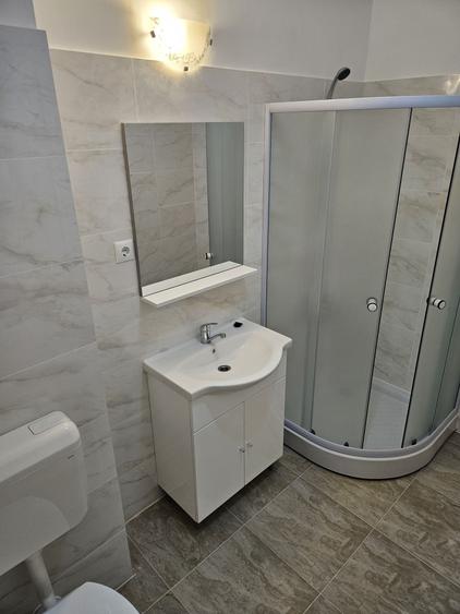 Apartament cu 2 camere semidecomandat în Cățelu