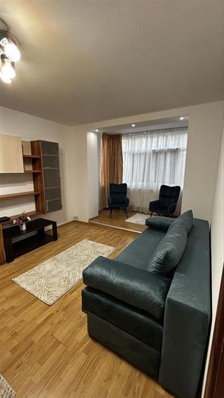 Apartament cu 2 camere semidecomandat, mobilat în Podu Roș