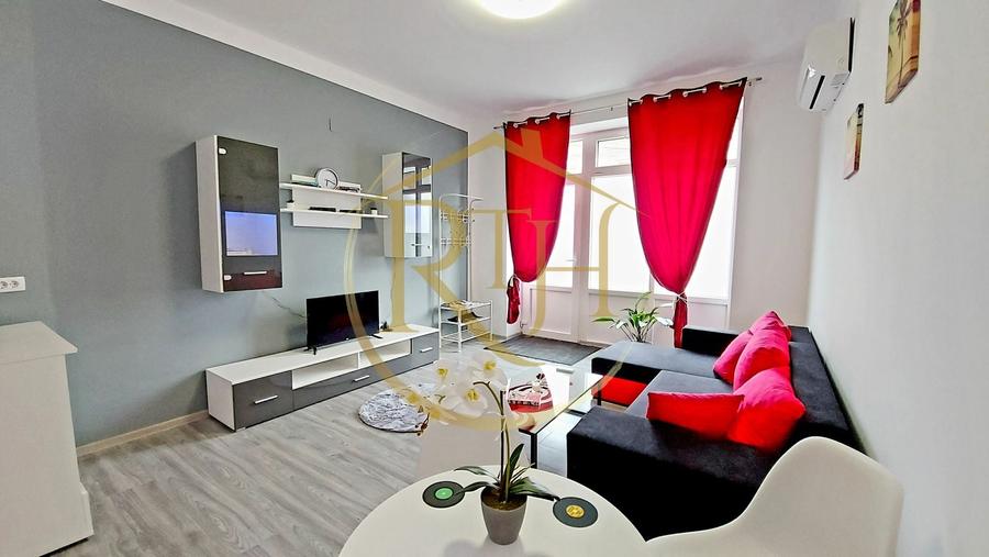 Apartament cu 2 camere semidecomandat, mobilat în Central